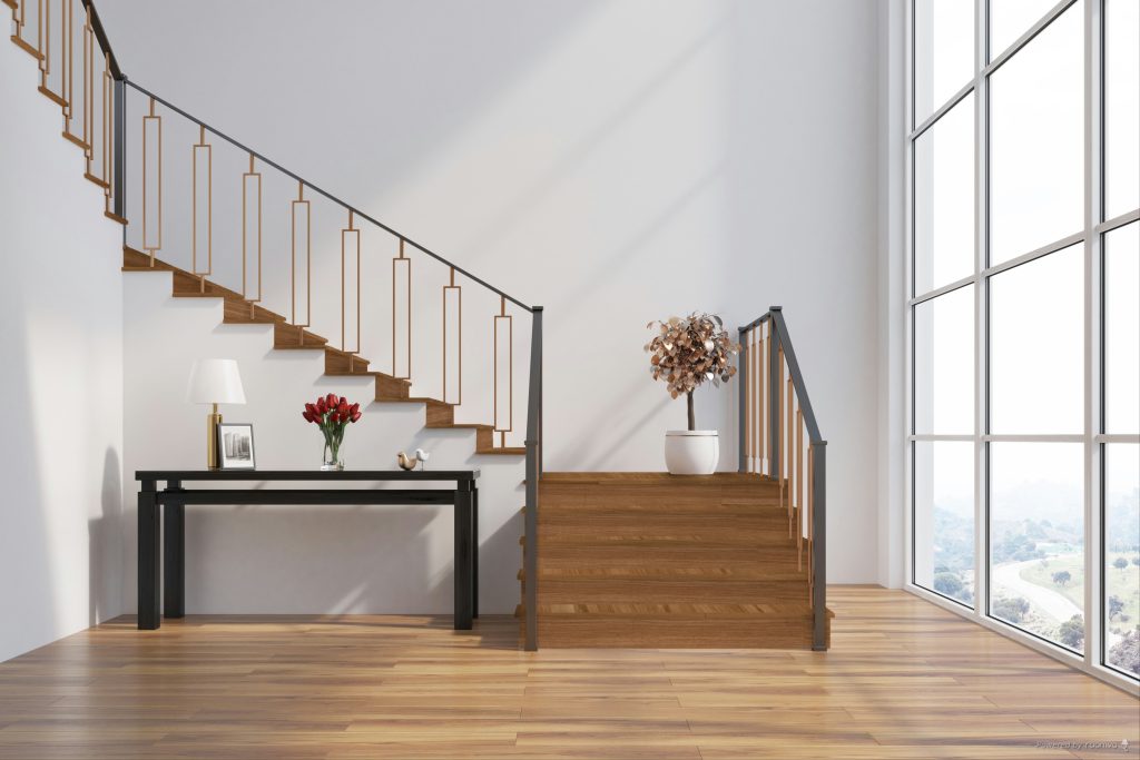 Escalera interior con acabados inspirados en madera natural que aportan calidez, iluminación y sensación acogedora al hogar.