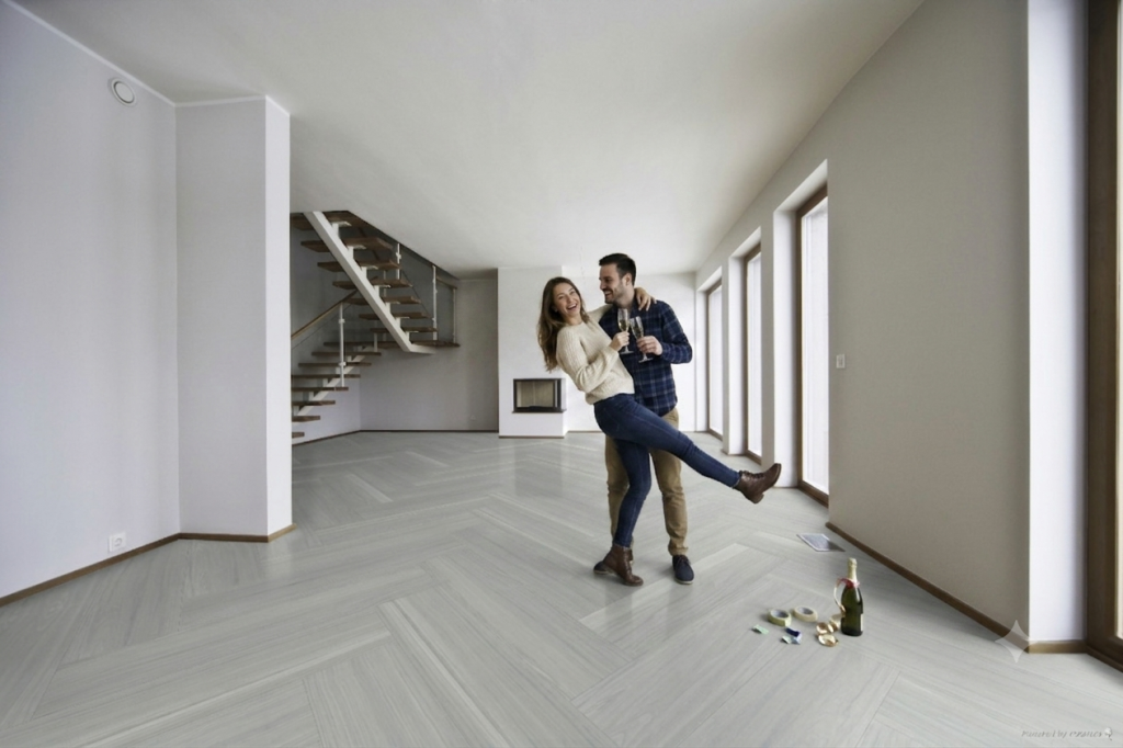 Espacio residencial moderno con piso Nebula Dual en tonos grises claros y diseño contemporáneo durante una remodelación interior.